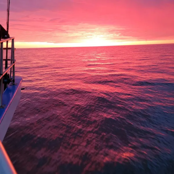 a sunset over a body of water