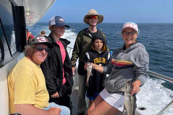 a couple of people that are sitting on a boat