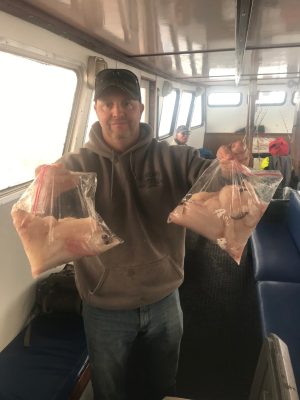 a person standing next to a window