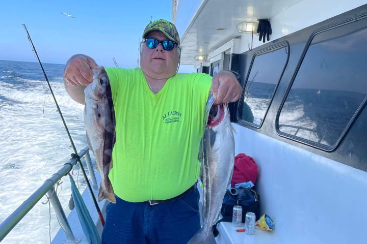 a man that is standing in the snow