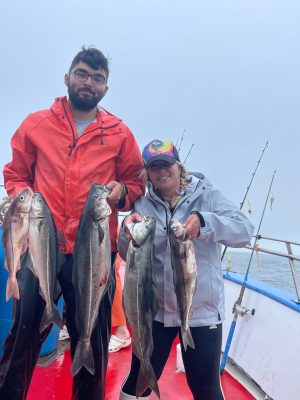 a man holding a fish