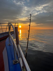 a sunset over a body of water