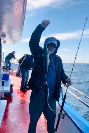 a group of people on a boat in the water