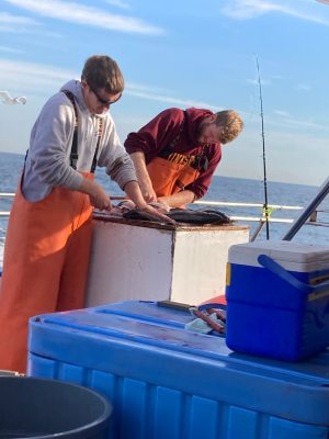 a man holding a piece of luggage