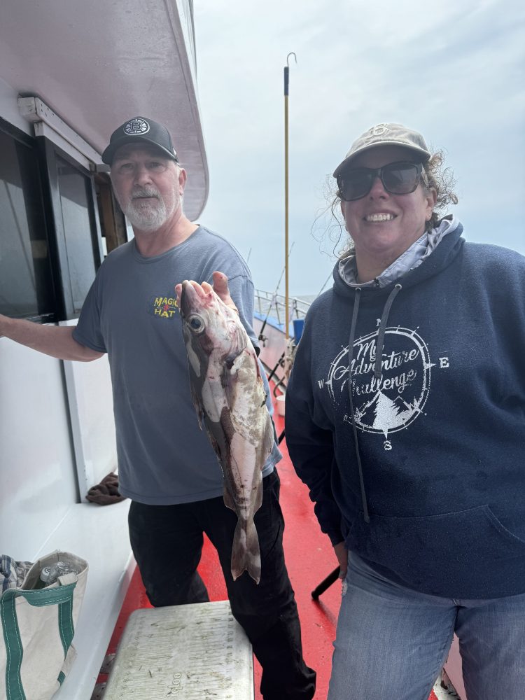 Carney Lansford holding a fish