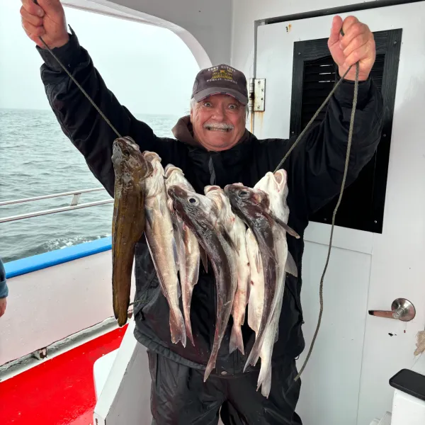 a person holding a fish