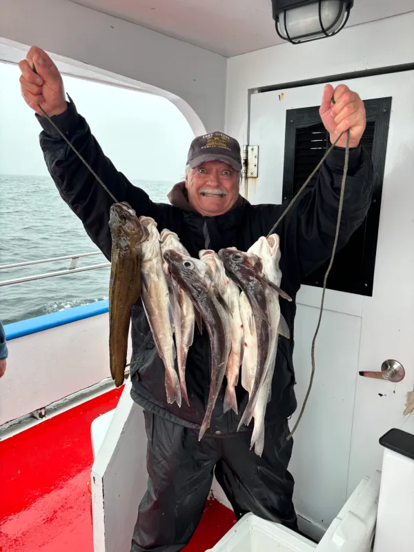 a person holding a fish