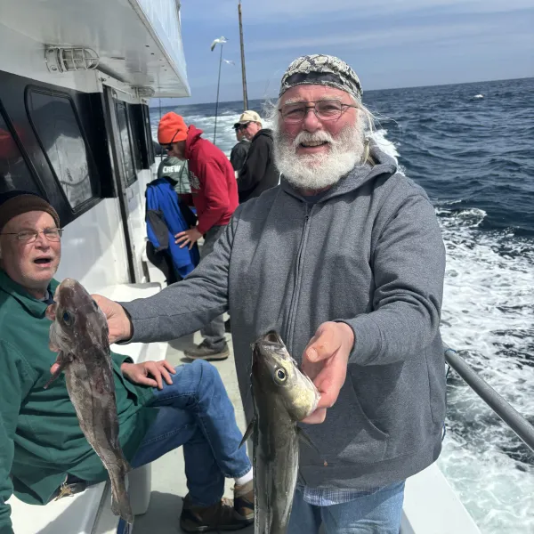 a person holding a fish