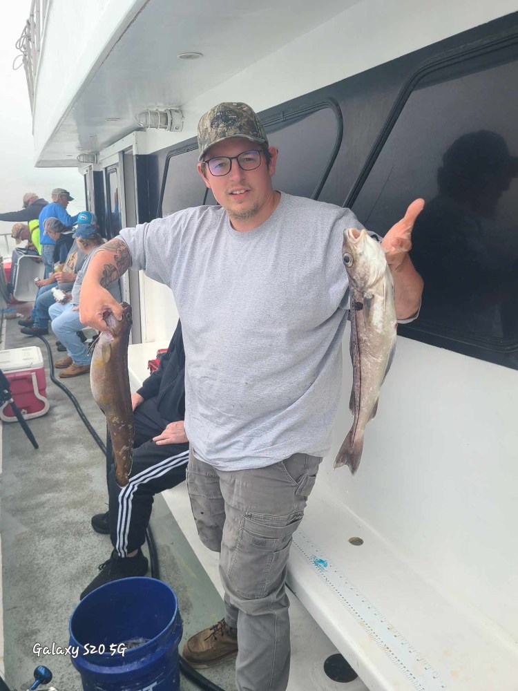 a man holding a fish