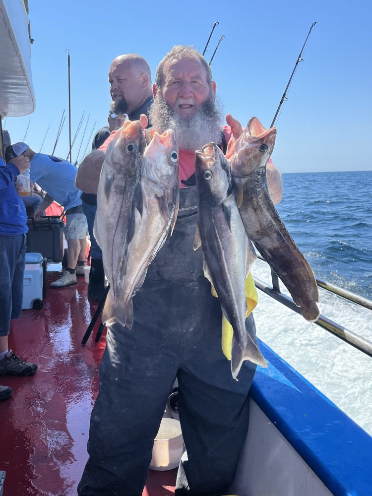 a person holding a fish