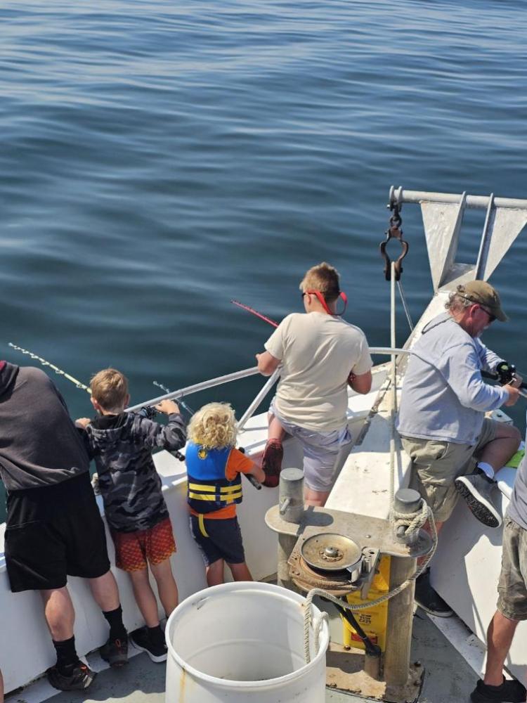 a group of people on a boat