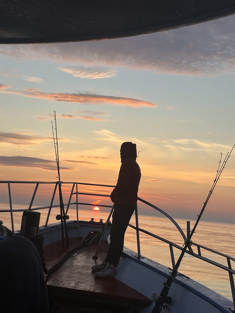 a sunset over a body of water