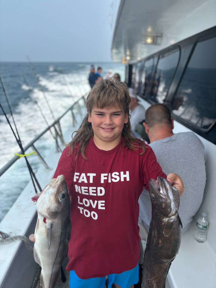 Luke Erceg holding a fish