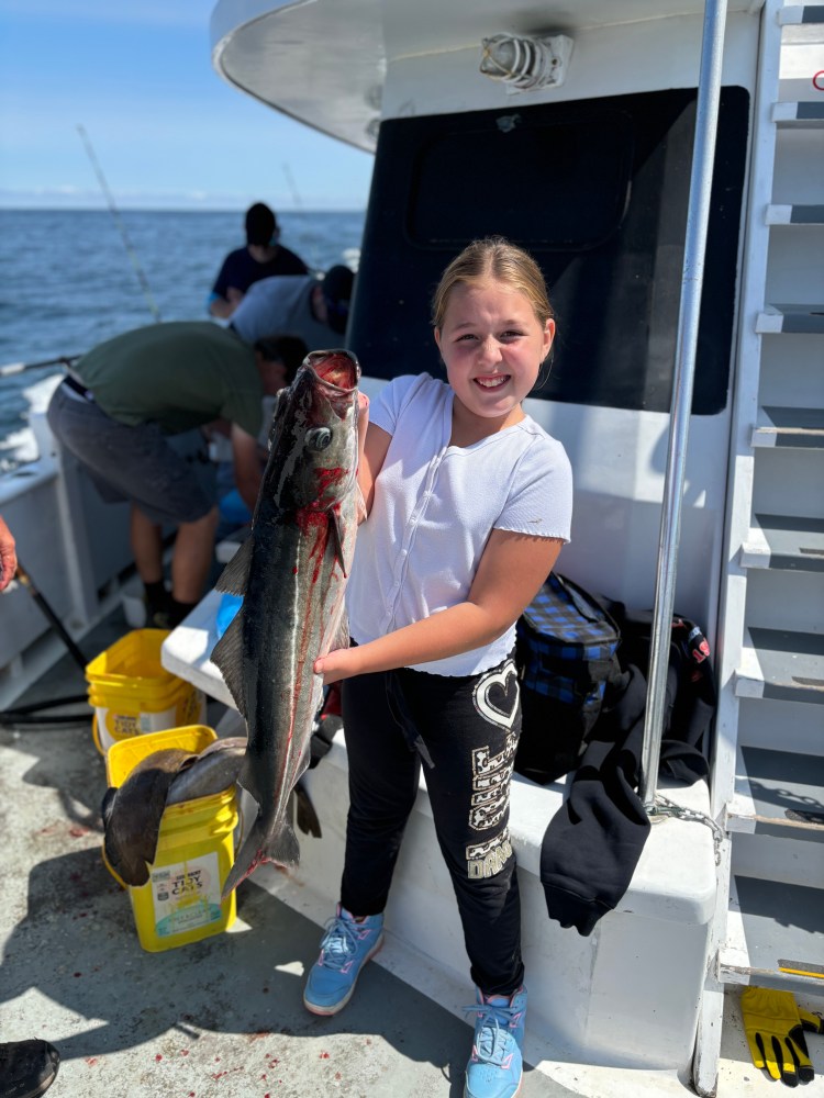 Emma Ridley holding a fish