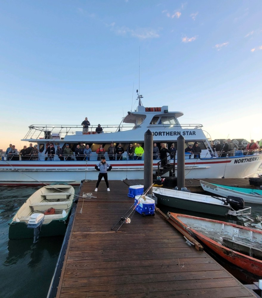 a boat docked at a dock