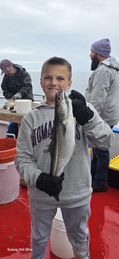 a person holding a fish