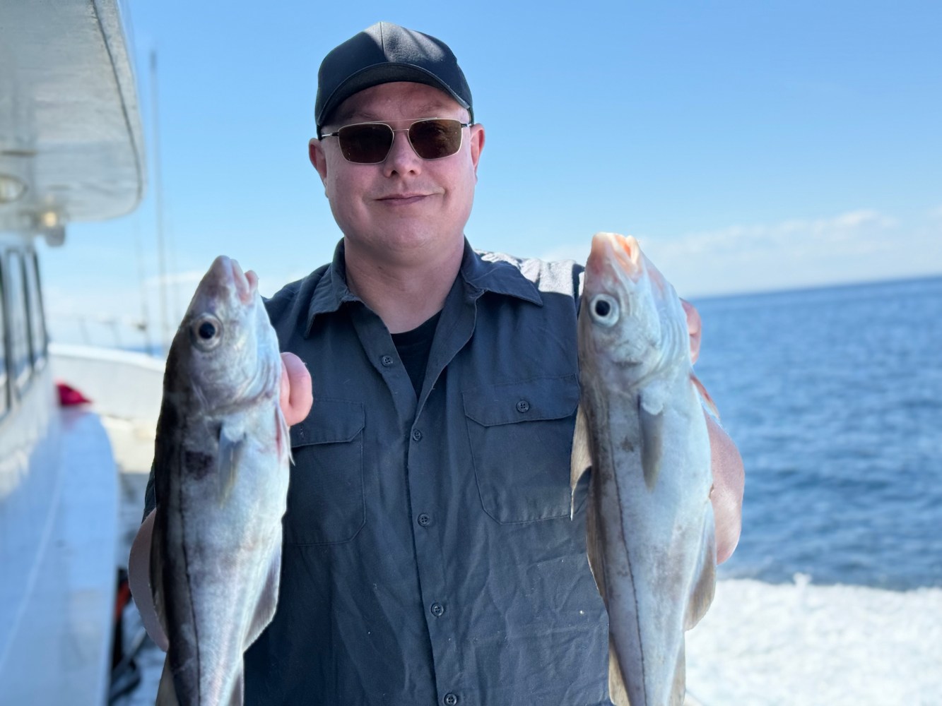 a person holding a fish