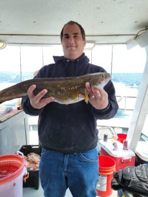 a person holding a fish