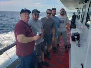 a group of people posing for the camera