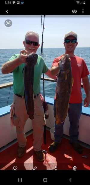 a group of people on a boat in the water