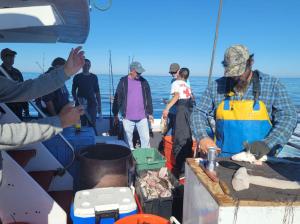 a group of people on a boat