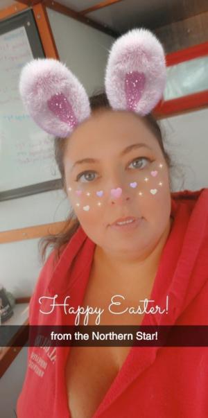 a little girl posing for a picture