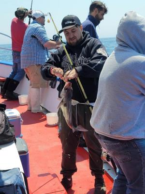 a group of people with their luggage