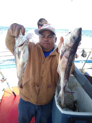 a person holding a fish